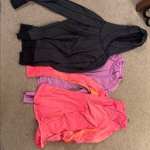 Lot of 3 long sleeve Lululemon tops. Size 8. GUC